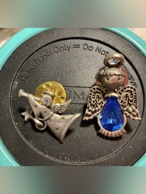 Angel and Trumpet Enamel Pins with Blue Teardrop Accent
